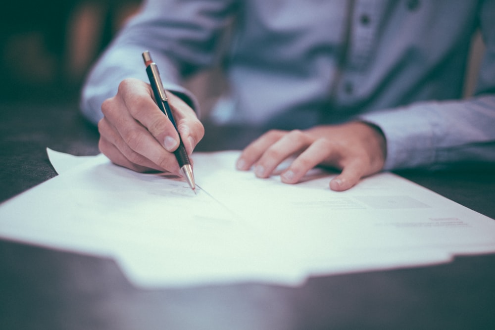 A couple reviewing paperwork together at home